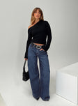 back view of model wearing Princess Polly Naylor Wide Leg Jeans Mid Blue Denim Petite Mid Rise 