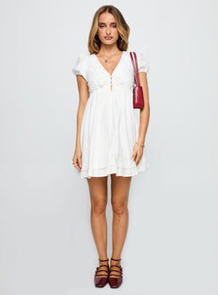 front view of model wearing Princess Polly Sailoh Puff Sleeve Baby Doll Mini Dress White V-Neck 