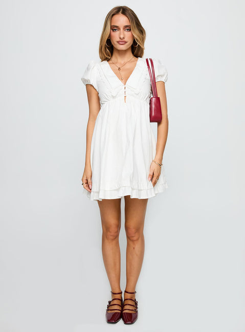 front view of model wearing Princess Polly Sailoh Puff Sleeve Baby Doll Mini Dress White V-Neck 