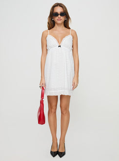 side view of model wearing Princess Polly Mahony Mini Dress White V-Neck 