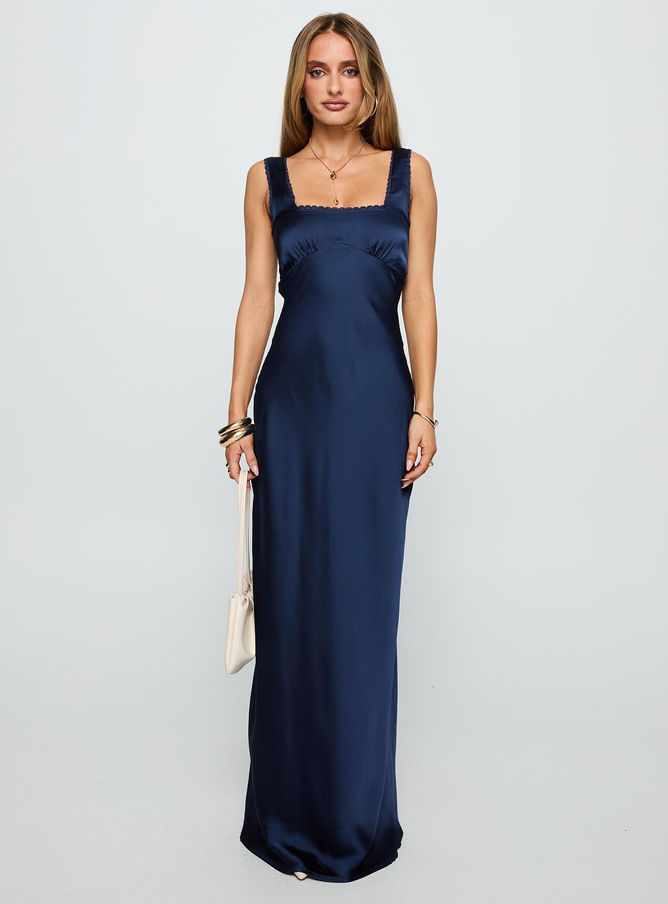 side view of model wearing Princess Polly Dasha Satin Maxi Dress Navy Square Neck 