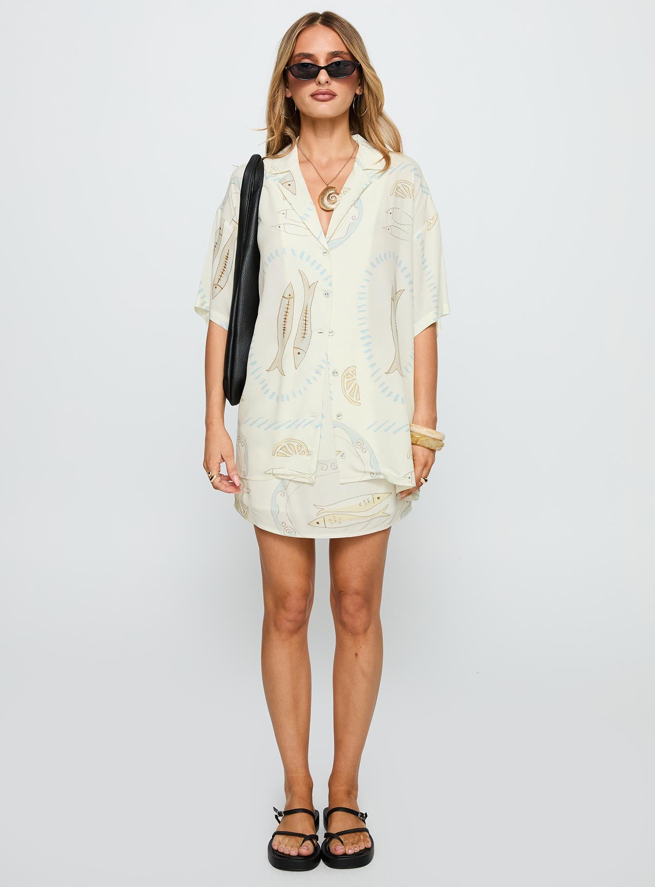   front view of model wearing Princess Polly Caraliia Mini Skirt Cream Mini Skirts 