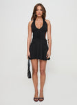 front view of model wearing Princess Polly Maeva Halter Mini Dress Black Petite Plunger 