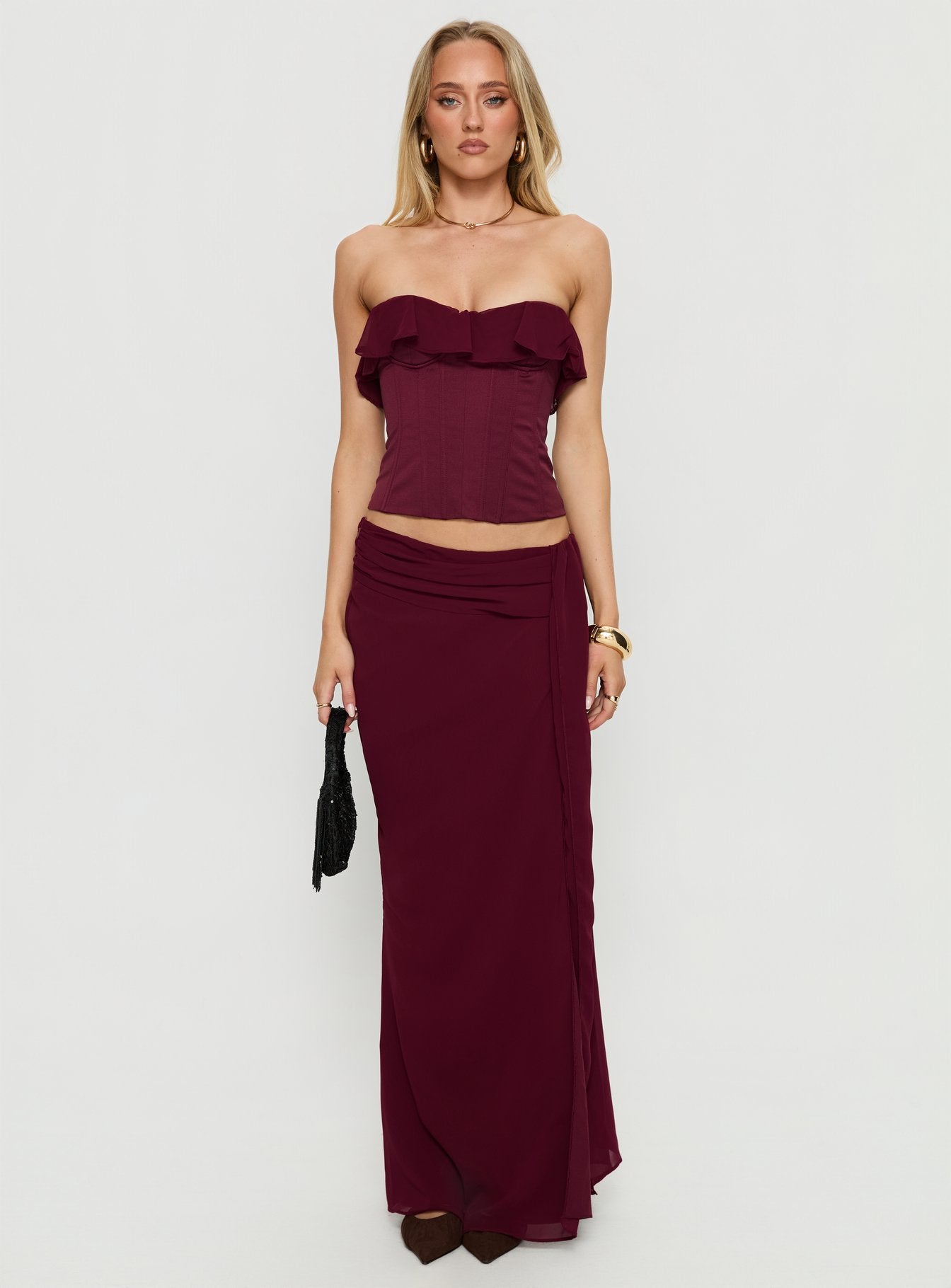   side view of model wearing Princess Polly Hollian Draped Maxi Skirt Wine Maxi Skirts 