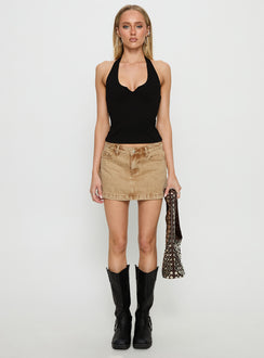   front view of model wearing Princess Polly Nicolina Low Rise Denim Mini Skirt Sandy Brown Mini Skirts 