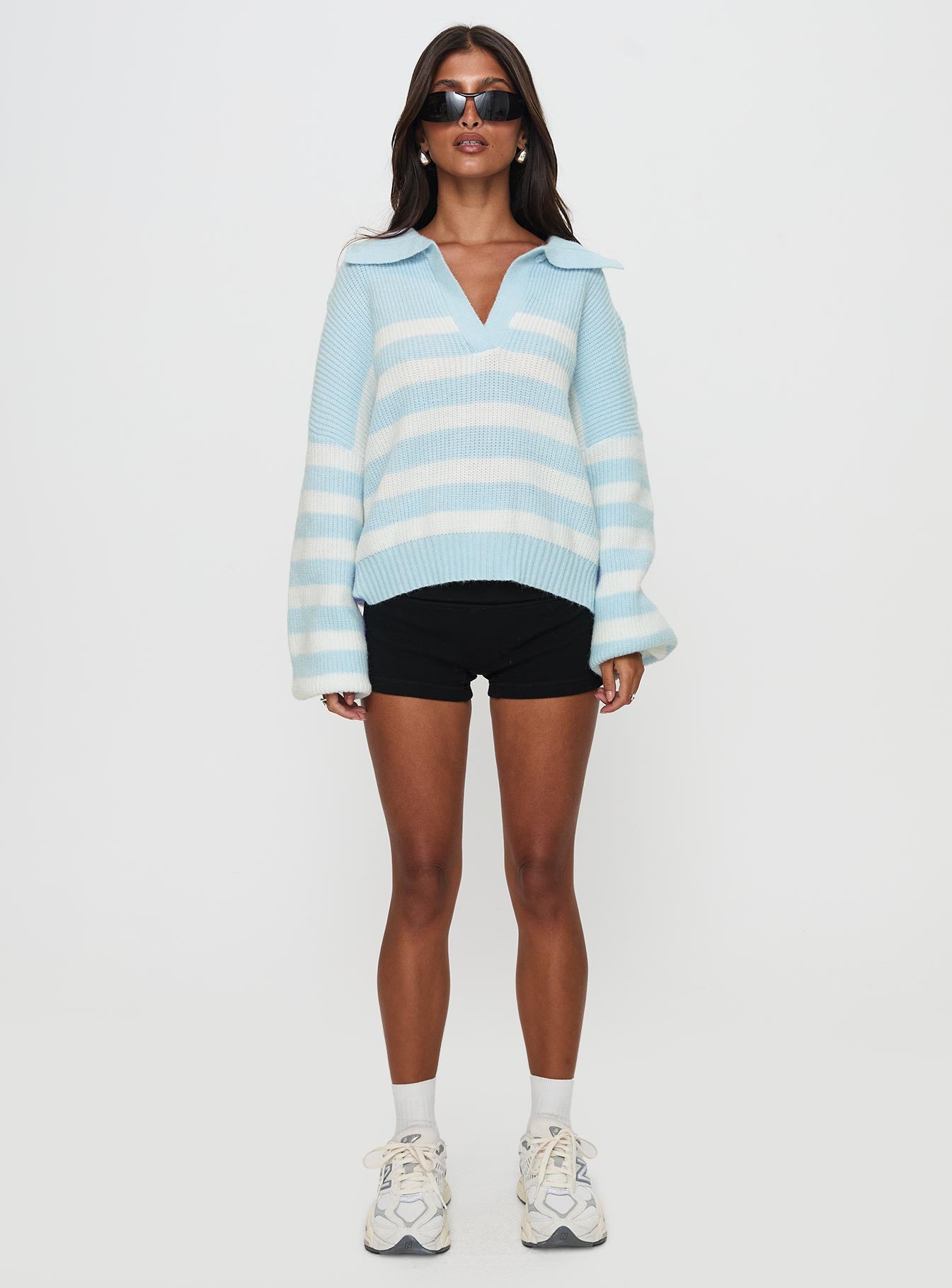 side view of model wearing Princess Polly Carolena Long Sleeve Collared Knit Sweater Blue / White Stripe Long 