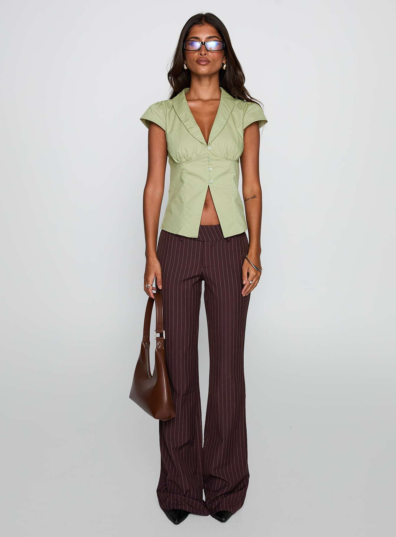 front view of model wearing Princess Polly Crowd Control Collared Top Sage Short Sleeves Plunger 