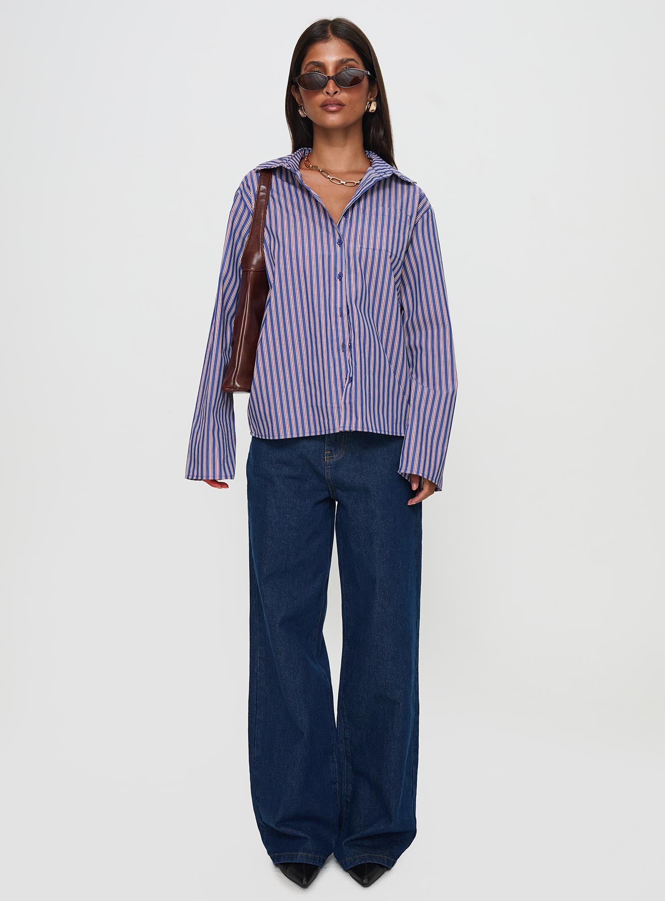 back view of model wearing Princess Polly Trillian Long Sleeve Top Navy Stripe Full Sleeves V-Neck 