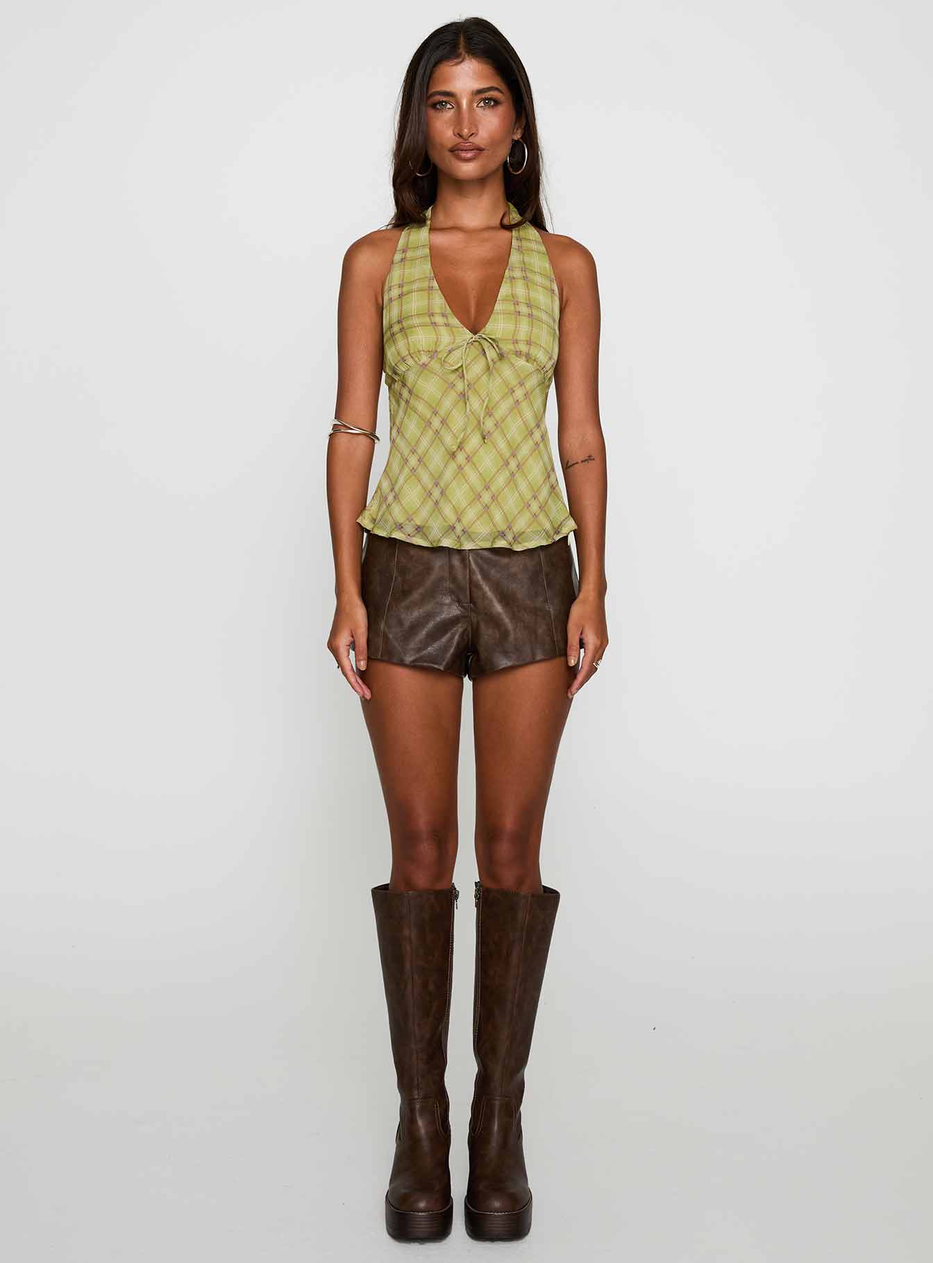 front view of model wearing Princess Polly Amalthea Top Green Check Sleeveless Plunger 