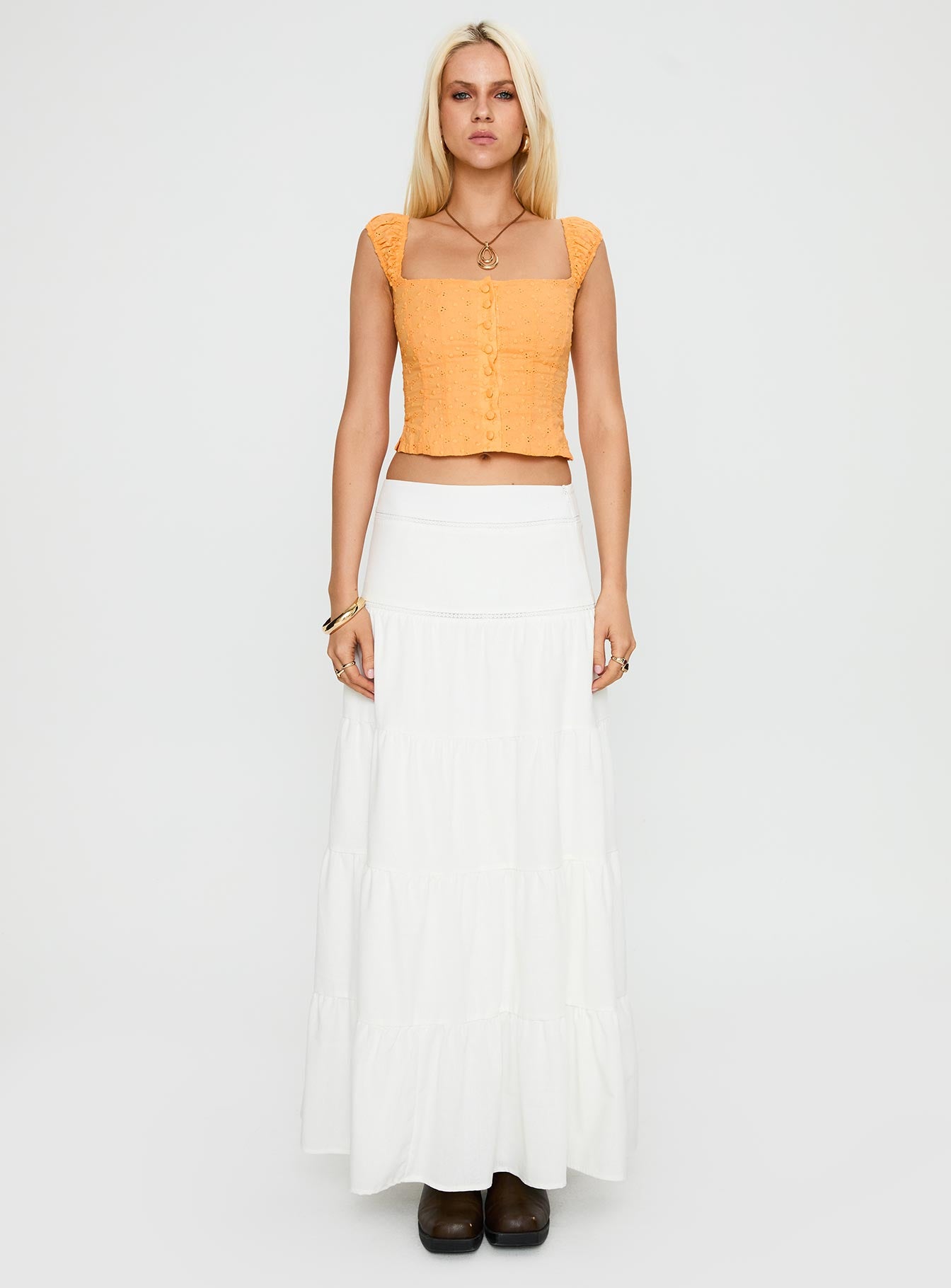 front view of model wearing Princess Polly Lyncher Top Orange Short Sleeves Square Neck 