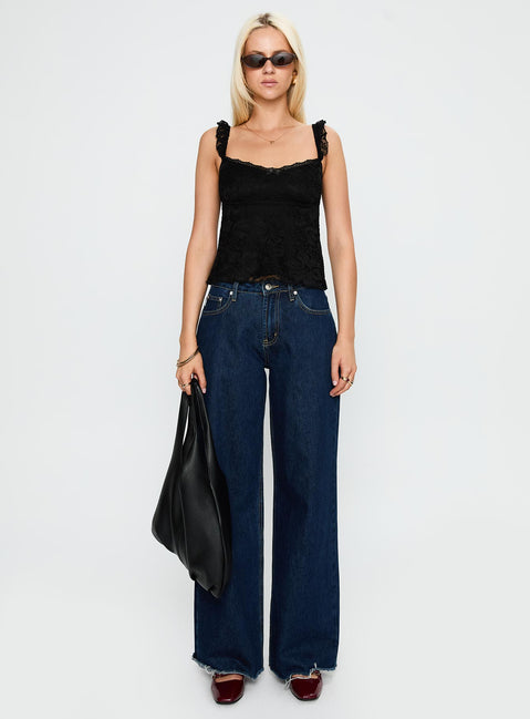 side view of model wearing Princess Polly Madaleine Lace Top Black Sleeveless Scoop Neck 