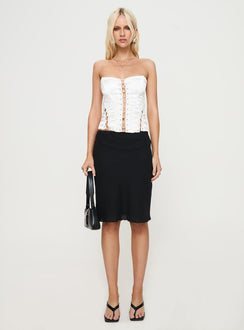 side view of model wearing Princess Polly Mochi Corset Top White Sleeveless Sweetheart 