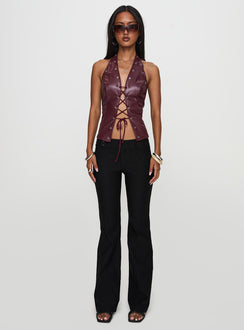 front view of model wearing Princess Polly I've Been There Faux Leather Halter Top Red Sleeveless V-Neck 