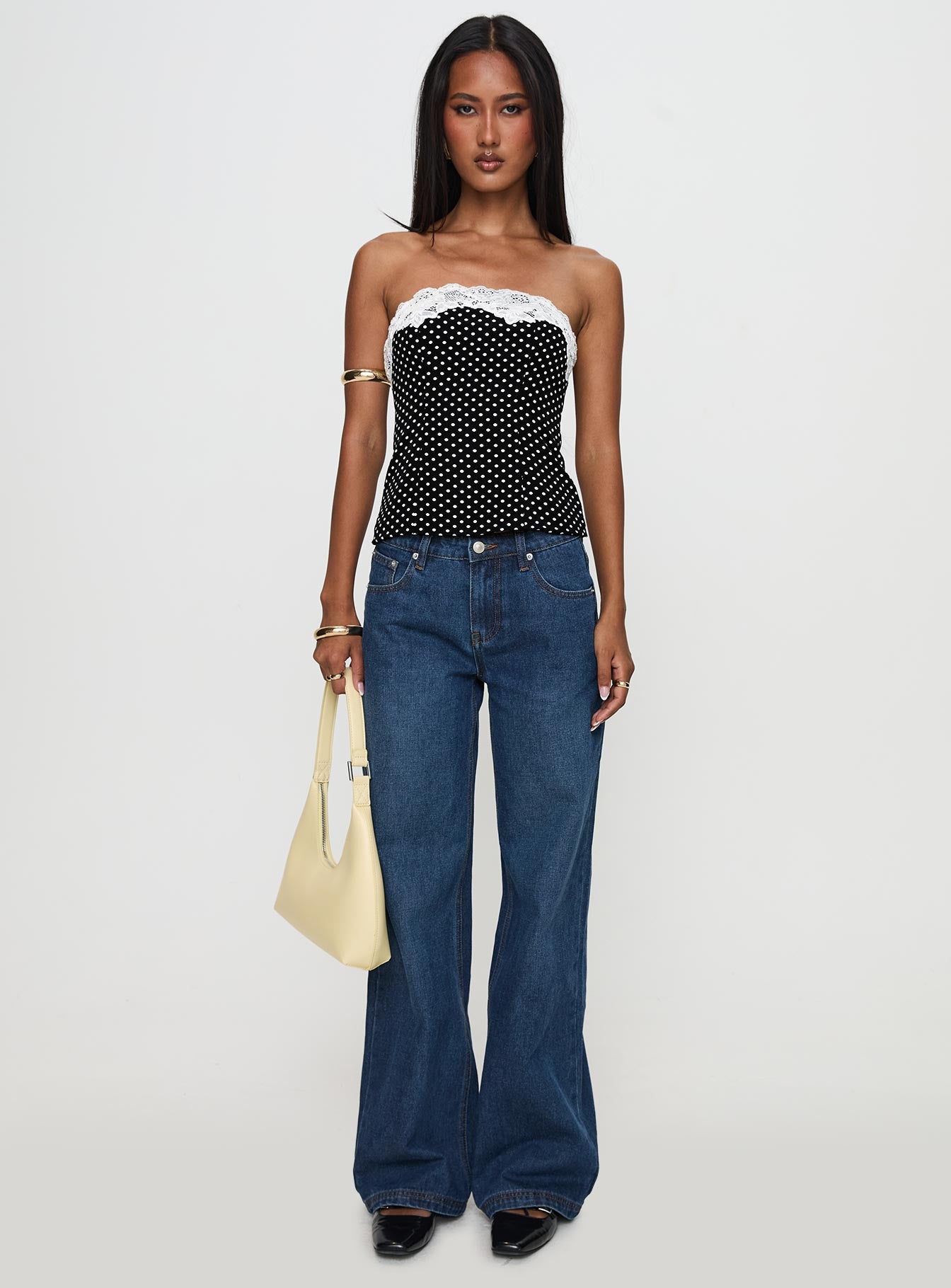 front view of model wearing Princess Polly Ettore Lace Trim Strapless Top Black Polka Sleeveless straight 