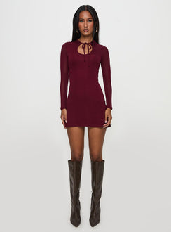 side view of model wearing Princess Polly Primavera Long Sleeve Mini Dress Wine High Neck 