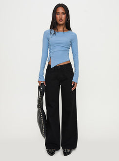 side view of model wearing Princess Polly Baseline Rib Long Sleeve Top Blue Full Sleeves Crew Neck 