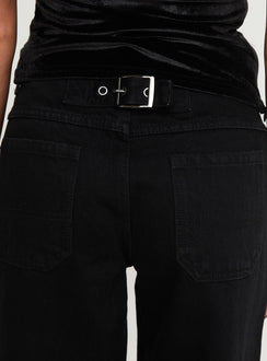 side view of model wearing Princess Polly Jankins Baggy Jeans Black Mid Rise 