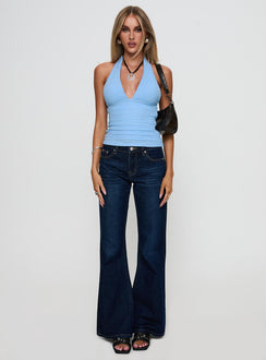 front view of model wearing Princess Polly Rearview Low Rise Jeans Dark Blue Low Rise Jeans 