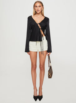 front view of model wearing Princess Polly Mariah Long Sleeve Top Black Full Sleeves Plunger 