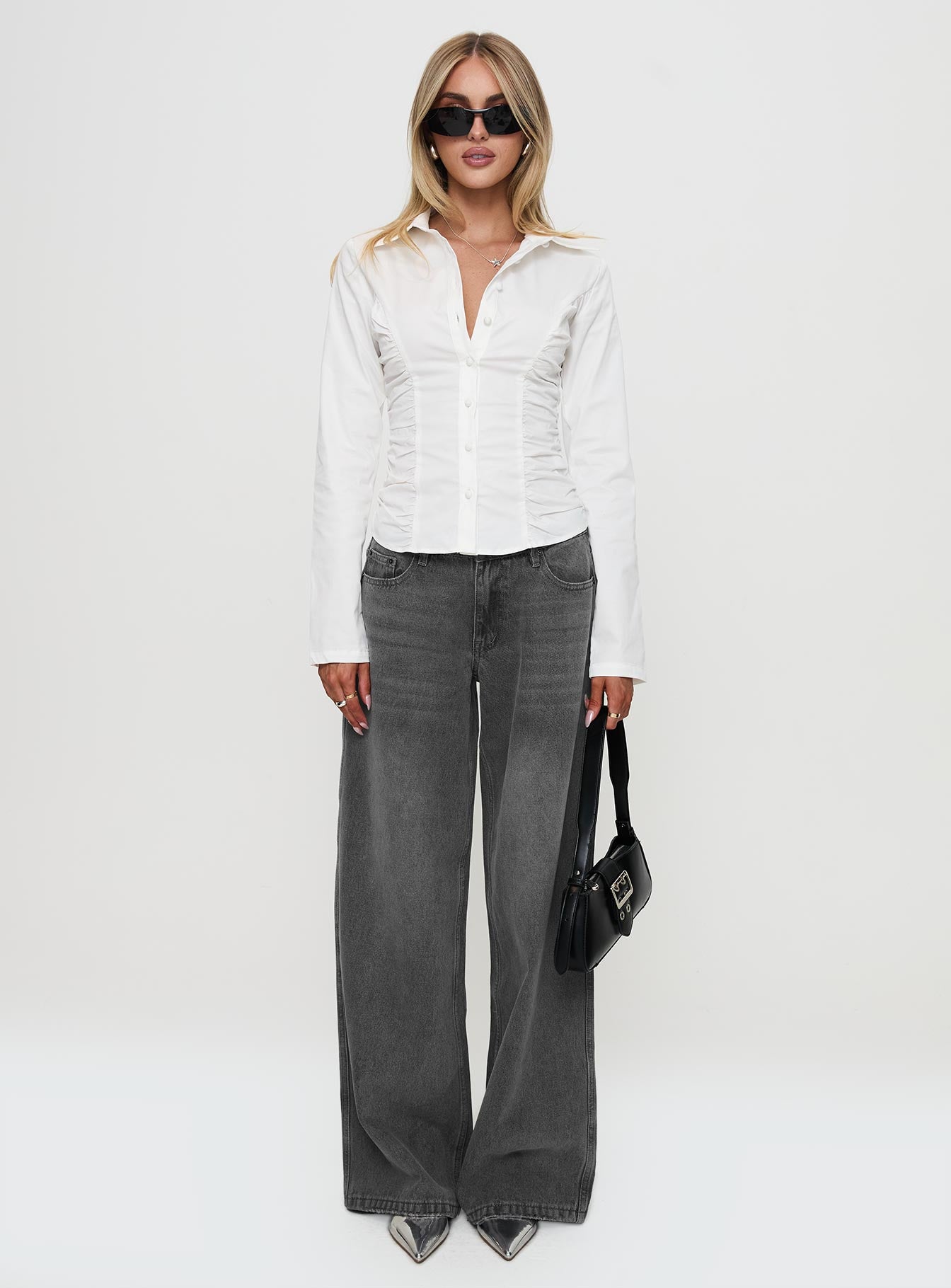 side view of model wearing Princess Polly Stand Up Guy Long Sleeved Ruched Detail Top White Full Sleeves V-Neck 