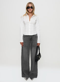 side view of model wearing Princess Polly Stand Up Guy Long Sleeved Ruched Detail Top White Full Sleeves V-Neck 