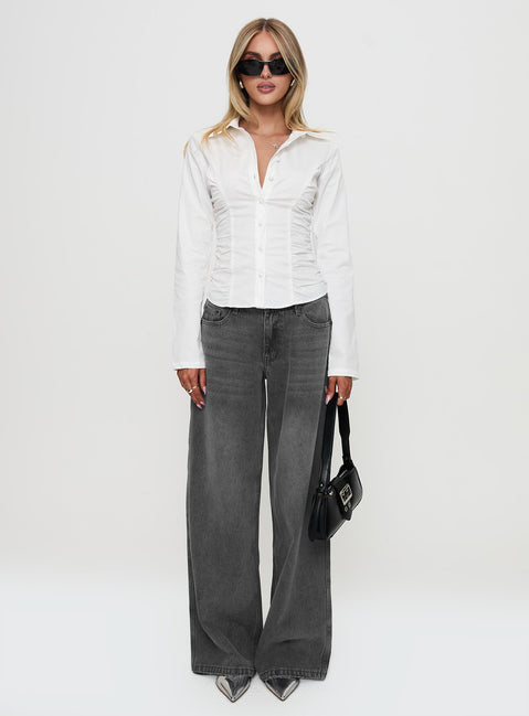 side view of model wearing Princess Polly Stand Up Guy Long Sleeved Ruched Detail Top White Full Sleeves V-Neck 