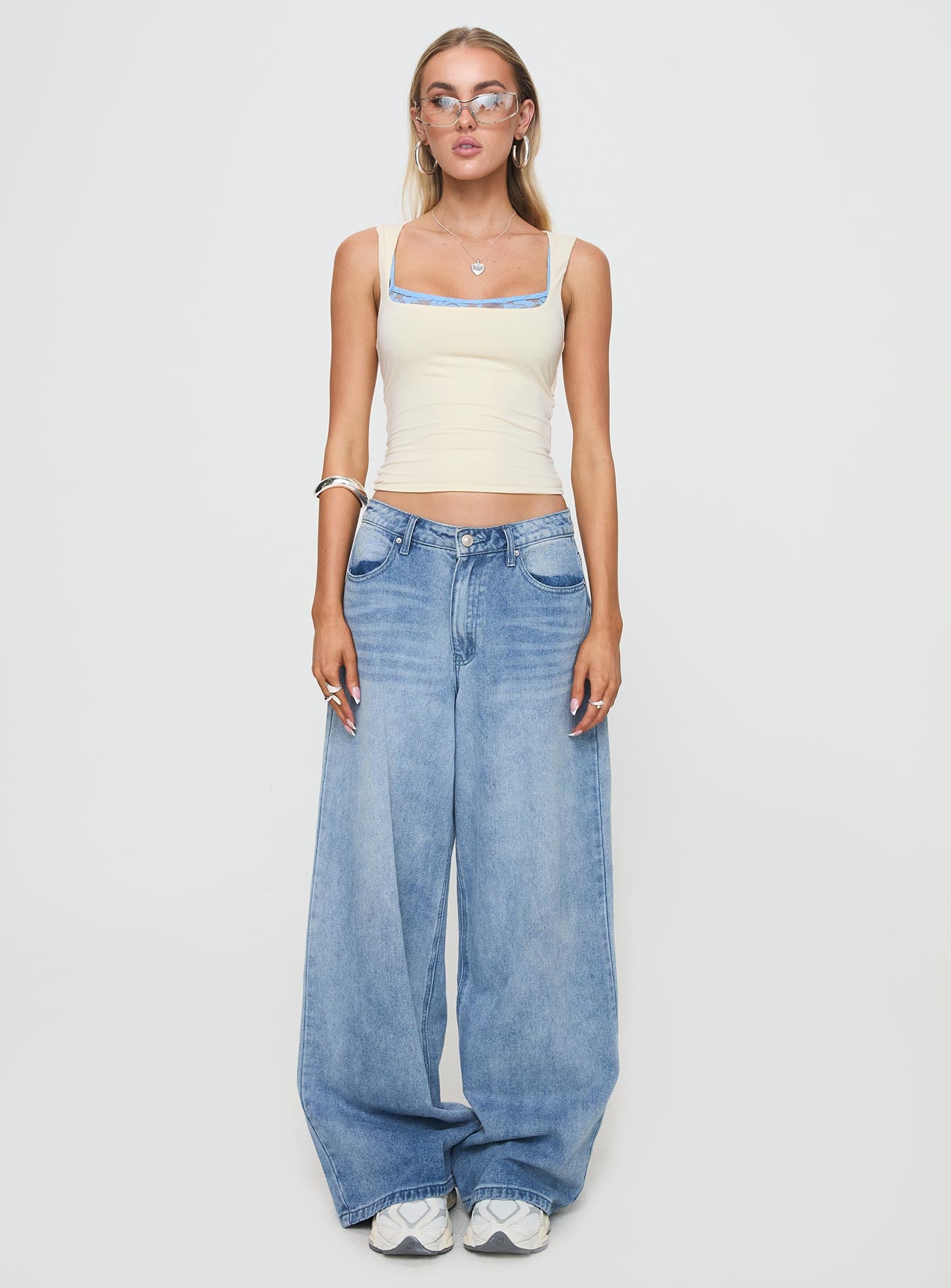 front view of model wearing Princess Polly Back In Time Top Cream/Blue Sleeveless Scoop Neck 