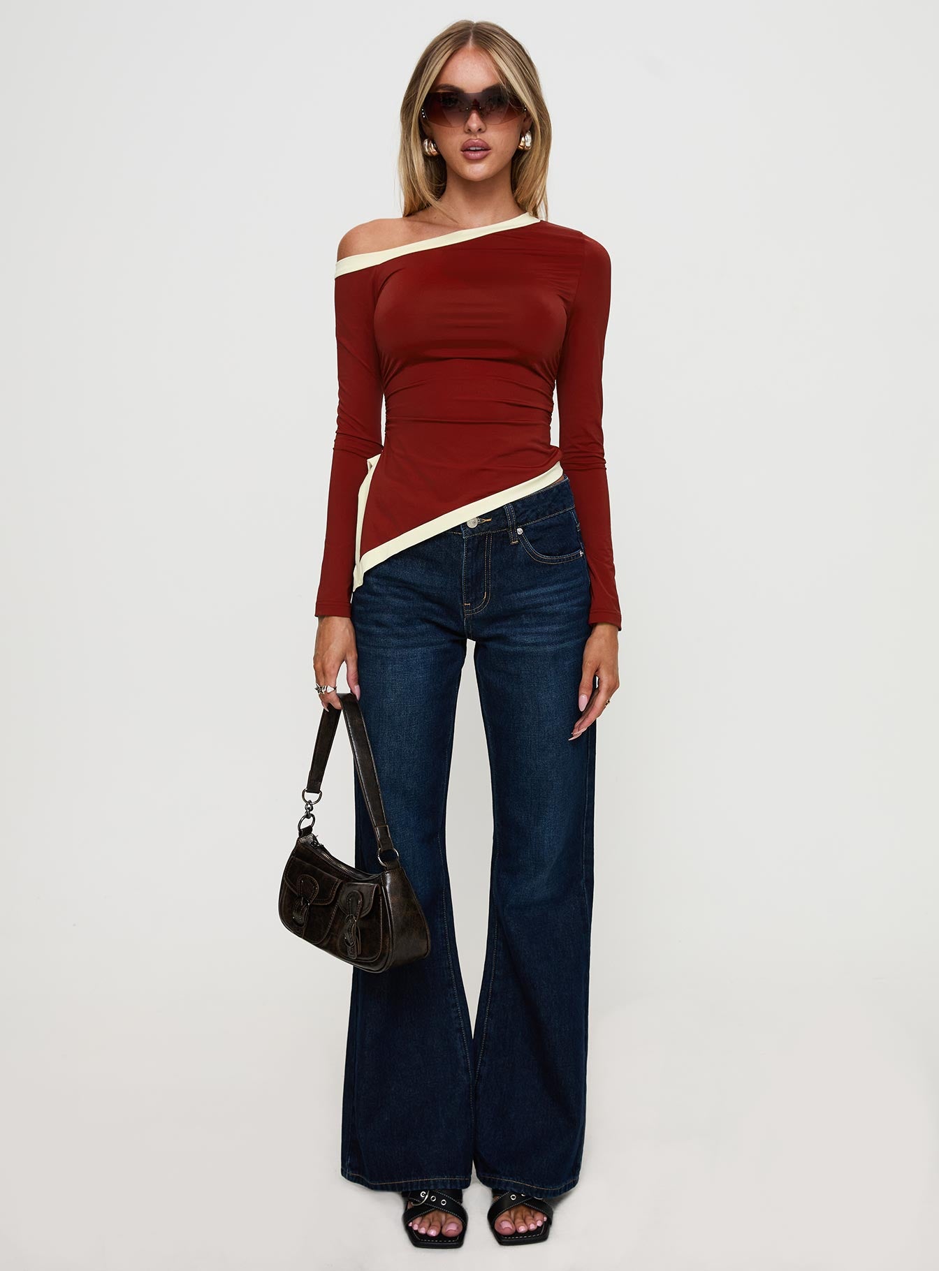 front view of model wearing Princess Polly Fake Smile Long Sleeve Top Burgundy / Cream Full Sleeves Asymmetric Neckline 