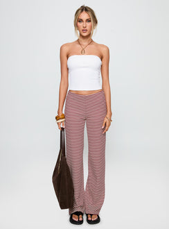 side view of model wearing Princess Polly Next To Me Lounge Pant Red / White Stripe Low Rise Pants 