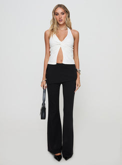 side view of model wearing Princess Polly Fontanne Twist Top White Sleeveless Plunger 