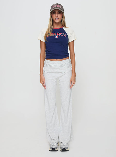 side view of model wearing Princess Polly France Fantasy Top Navy Short Sleeves Crew Neck 