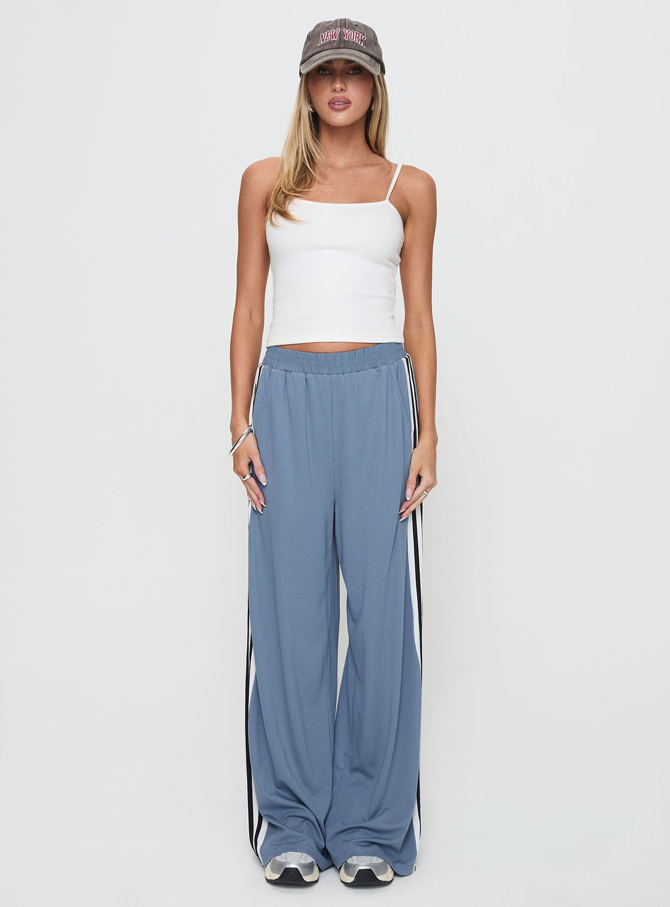 front view of model wearing Princess Polly Dime Track Pants Blue High Waisted Pants 
