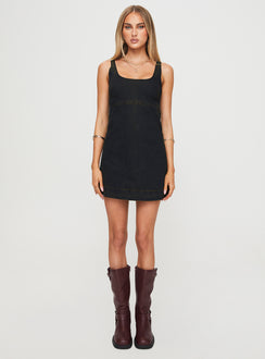 back view of model wearing Princess Polly Rautha Denim Mini Dress Black Square Neck 