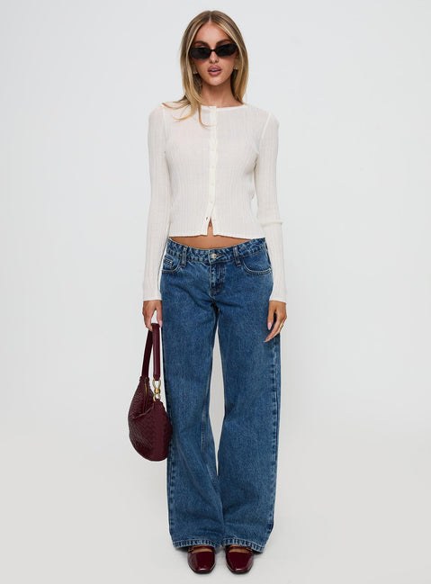 front view of model wearing Princess Polly Cowrie Long Sleeve Button Up Top White Full Sleeves Crew Neck 