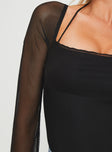 side view of model wearing Princess Polly Liva Sheer Sleeve Bodysuit Black Sleeveless 