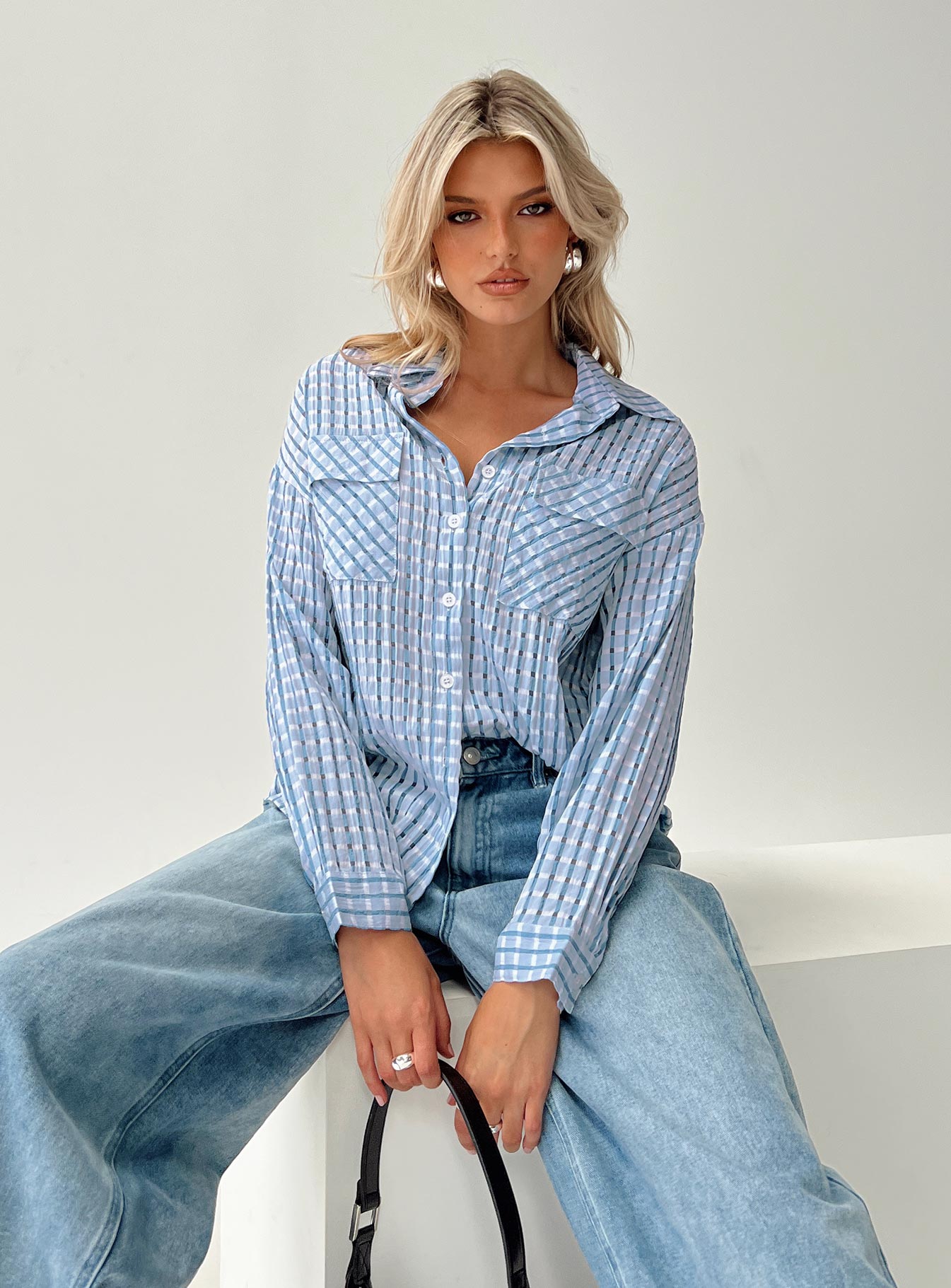 front view of model wearing Princess Polly Oristano Shirt Blue Full Sleeves V-Neck 