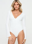 front view of model wearing Princess Polly Xander Long Sleeve Bodysuit White Full Sleeves 