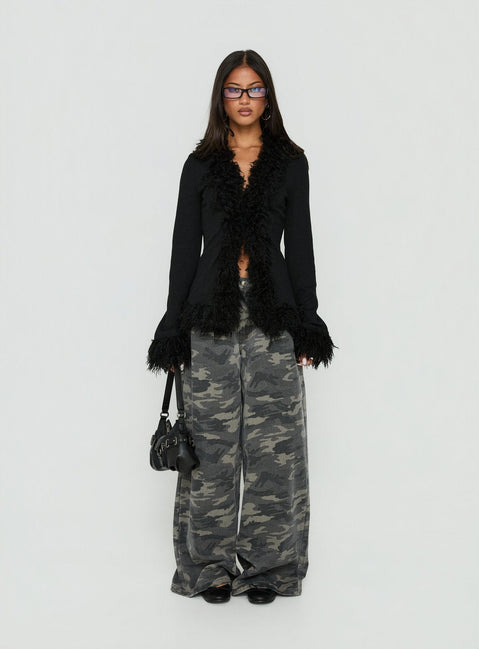 Highlighting the Brynlie Faux Fur Trim Boxy Cardigan in Black womens-jumpers with short length on-body view of model wearing Princess Polly