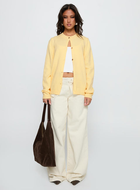 side view of model wearing Princess Polly Arica Button Up Knit Cardigan Lemon Longline Jumpers 