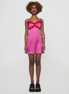 side view of model wearing Princess Polly Idyllic Mini Dress Pink V-Neck 