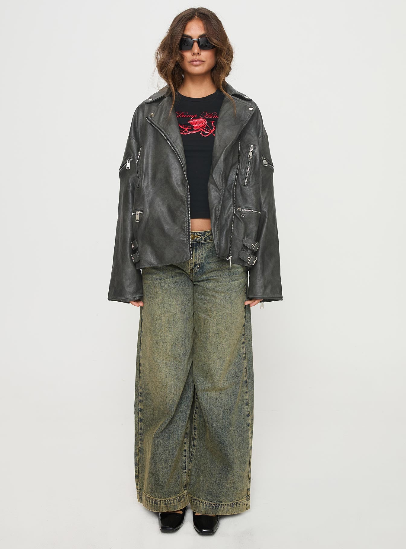 Faux leather jacket Classic collar, oversized lapels, six pocket design, zip fastening, buckle detail Non-stretch material, fully lined 