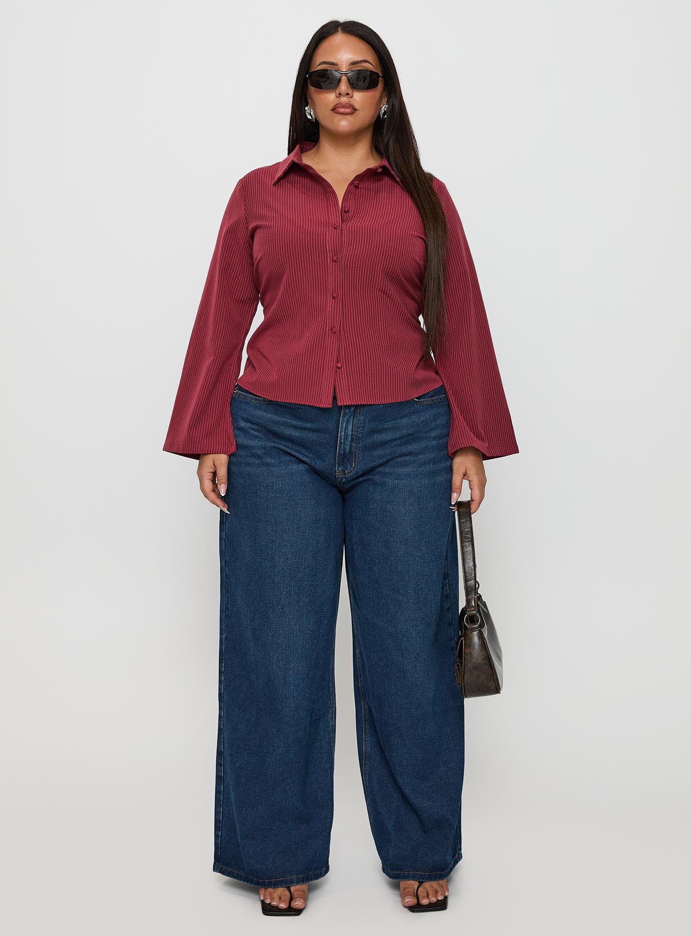 front view of model wearing Princess Polly Anni Pinstripe Shirt Red Curve Full Sleeves V-Neck 