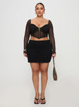   front view of model wearing Princess Polly Karley Low Waist Mini Skirt Black Curve Mini Skirts 