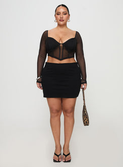   front view of model wearing Princess Polly Karley Low Waist Mini Skirt Black Curve Mini Skirts 