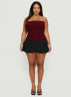   front view of model wearing Princess Polly Sonsie Mini Skirt Black / White Polka Curve 