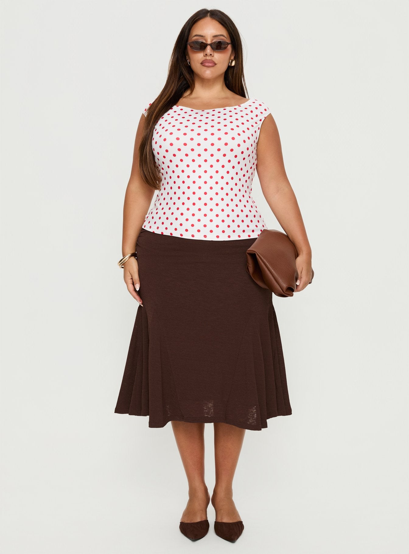   front view of model wearing Princess Polly Lewish Low Rise Midi Skirt Chocolate Curve Midi Skirts 