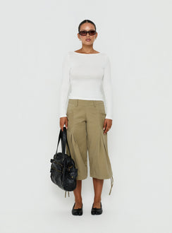 Showcasing the Iria Capri Trouser Khaki womens-regular-pants with mid-rise waist front view of model wearing Princess Polly