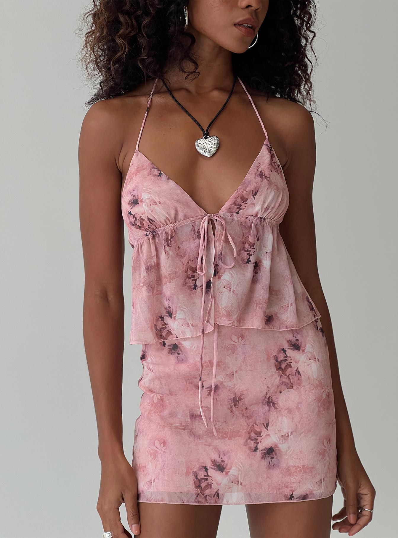 Matching set, floral print Halter neck top, plunging neckline, tie fastening at bust, adjustable coverage Mini skirt, invisible zip fastening at the side  Partially lined, non-stretch material 