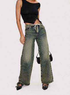back view of model wearing Princess Polly Mellowed Out Slouchy Jeans Antique Wash Mid Rise 