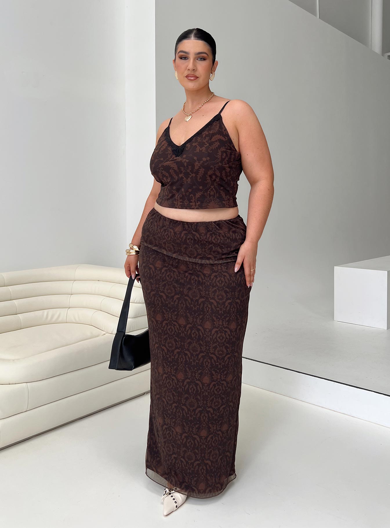   side view of model wearing Princess Polly Hostona Maxi Skirt Mutli Curve Maxi 